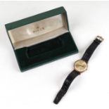 A Rolex Precision gentleman's gold wristwatch with baton indices and centre seconds dial, on a