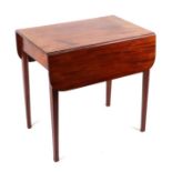 An early 19th century mahogany Pembroke table, 68cms wide.