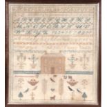 A Victorian sampler with alphabet, birds and central house by 'Fanny Smith 1856', framed & glazed,