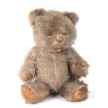 A vintage plush mohair teddy bear, approx 40cms high.Condition Report Growling mechanism present but