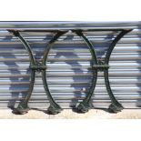 A pair of Walter MacFarlane & Co cast iron table legs, 71cms high (2).