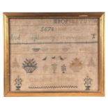 A Victorian sampler with letters, numbers, animals and flowers by 'Caroline Palmer', framed &