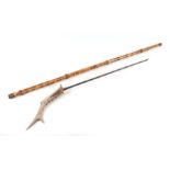 A cane shafted sword stick with a stag horn handle and having a 44.5cms (17.5ins) triangular section