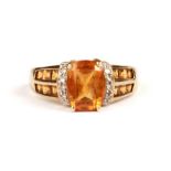 A 9ct gold yellow stone dress ring, approx UK size 'P', 3g.