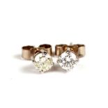 A pair of 18ct white gold diamond stud earrings.Condition ReportDiamond measurements approx 4mm