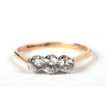 An 18ct gold and platinum three-stone moissanite ring, approx UK size 'P', 2.1g.Condition