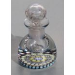 A Perthshire millefiori scent bottle stopper with central 'P' cane, 11cms high.