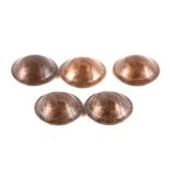 A set of five British army Brodie helmets made from English copper pennies, each coin dated for a