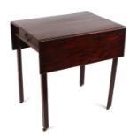 An early 19th century mahogany Pembroke table with single frieze drawer, on square chamfered legs,