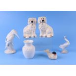 A pair of Beswick pottery spaniels, 13cms high; together with a Lladro goose; a Kaiser vase; boxed