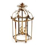 A Victorian style gilt metal hexagonal hall lantern, lacks two panes of glass, approx 60cms high