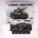 A 1/16 scale radio control German Panther Tank, boxed; together with a 1/16 US Military Truck with