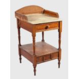 A Victorian pine washstand with three-quarter gallery above a single frieze drawer, on tapering