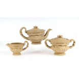 A Victorian three-piece Warwick vase form tea set, unmarked but possibly Wedgwood, the teapot