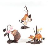 Three Royal Worcester and bronze groups, Hedgehog, Fox, and Mouse (3).