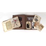 An Edwardian autograph album including photographs and signatures by Harry Lauder and Gunner Moir;