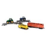 A quantity of assorted 'G' gauge rolling stock to include open wagons, trailers, tractors and