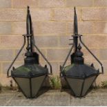A large pair of outside wall lanterns of octagonal form, on wall brackets, approx 80cms high (2).