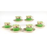 A group of Royal Doulton cups and saucers decorated with Dutch figures.