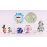 A group of porcelain pin cushion dolls; together with a Murano Art glass paperweight; and other