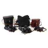 A pair of Lieberman & Gortz 16x50 binoculars, cased; together with two other pairs of binoculars,