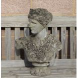 A well weathered garden bust depicting a classical lady, 61cms high.