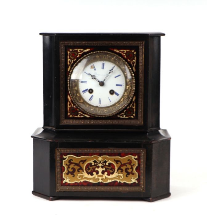 A French boulle cased mantle clock, the white enamel dial with Roman numerals, the movement striking