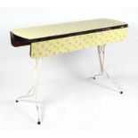 A 1950's Arvin mid century Formica drop-leaf table on splayed tubular steel legs, 104cms wide.