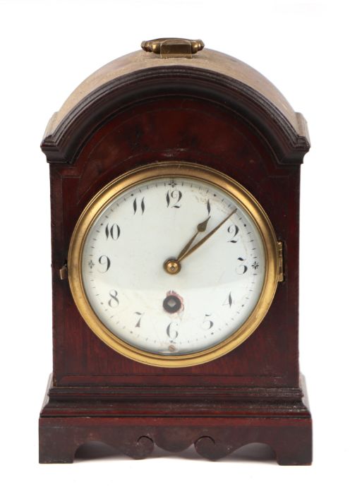 A 19th century mantle clock, the 10cms diameter white enamel dial with Arabic numerals and fitted