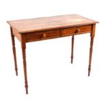 A late Victorian pine side table with two frieze drawers, on ring turned tapering legs, 102cms