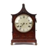 An early 19th century bracket clock, the 21cms white enamel dial with Roman numerals fitted with