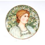 An earthenware Arts & Crafts wall plaque depicting a young woman, probably Minton, in the Pre-