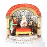 A Staffordshire pearlware group 'The New Marriage Act', a couple standing before a clergyman and