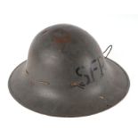 A WWII Zuckerman steel helmet as used by the Civil Defence Organisation, with painted stencil