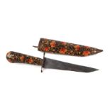 A Kashmiri dagger with highly decorated handle and scabbard, 28cms long.