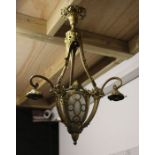 An Art Deco style gilt metal three-branch ceiling light.