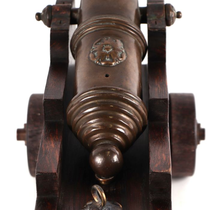 A 19th century bronze signal cannon, 44cms long, on a later wooden carriage. - Image 2 of 3