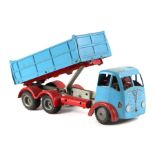 A Shackleton Foden clockwork tipper lorry with blue cab and body with red chassis and accompanying