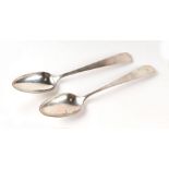 A pair of 19th century continental white metal serving spoons (possibly Russian), 23cms long,