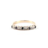 A 9ct gold sapphire and diamond half hoop ring, approx UK size 'P, 2.4g.