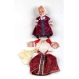 A 1930's Russian folk doll in traditional clothing, 34cms high, boxed.Condition Report Good