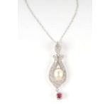 A 14ct white gold diamond, pearl and ruby pendant of lyre form, on a chain, 3.5g.