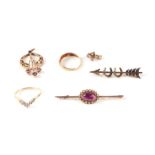 A 9ct gold and cabochon amethyst bar brooch; together with a 9ct gold pendant and a 9ct gold and