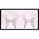A pair of Charles & Ray Eames for Herman Miller wirework mid century modern chairs (2).Condition