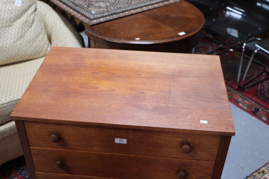 A mid 20th century teak chest in the manner of Heal's with an arrangement of five long drawers, on - Image 4 of 7