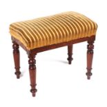 A Victorian mahogany stool on turned legs with upholstered seat, 52cms wide.