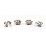 A set of four Chinese white metal menu stands in the form of crowns, marked 'Tai Hua', 53g (4).