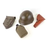 A quantity of assorted militaria to include a USA steel helmet; a collapsible field shovel; goggles;