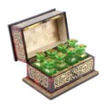 A 19th century French Boulle work scent bottle box containing eight green glass scent bottles with