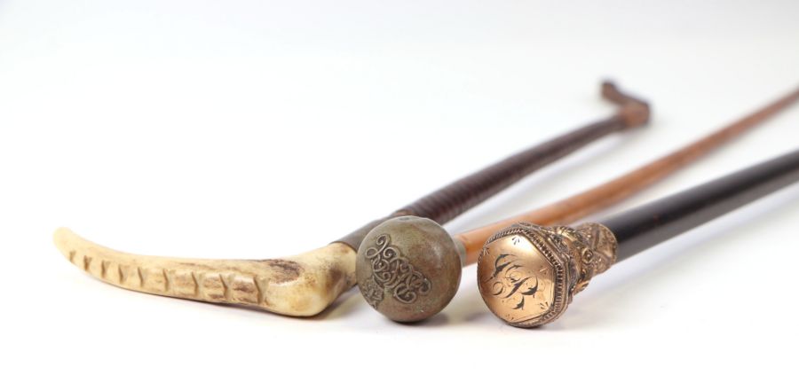 A late 19th century ebonised walking cane with gilt metal handle, 91cms long; together with a - Image 3 of 3